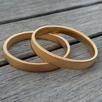 GOLDIE Sleeve Band